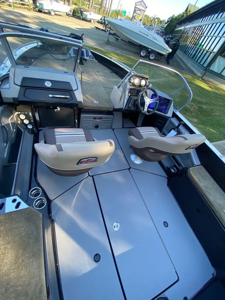 Slide: The Image of 2024 Ranger 620FS Ranger Cup Equipped boat interior with dual seats and modern dashboard. - 5