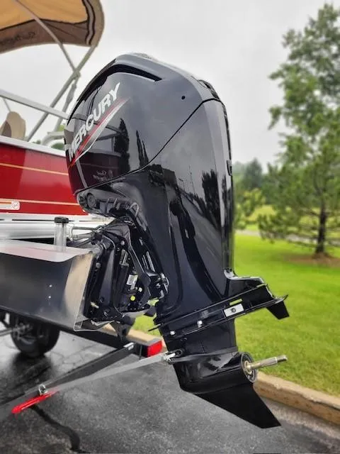 Slide: The Image of 2024 Sun Tracker Party Barge 18 DLX with Mercury outboard motor. - 2