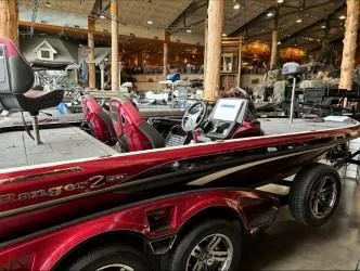 Slide: The Image of 2024 Ranger Z520R Ranger Cup Equipped boat in showroom, featuring sleek design and modern technology. - 3
