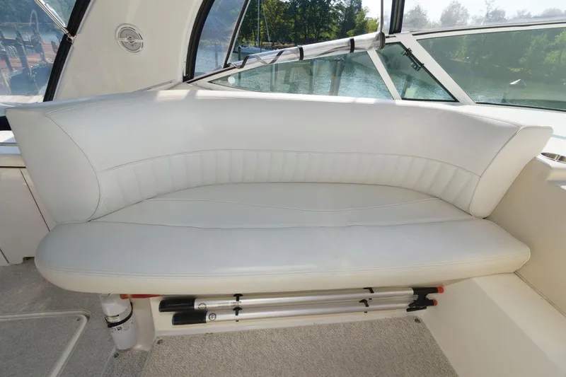 Slide: The Image of White leather seating on 2000 Cruisers Yachts 3672 Express. - 11