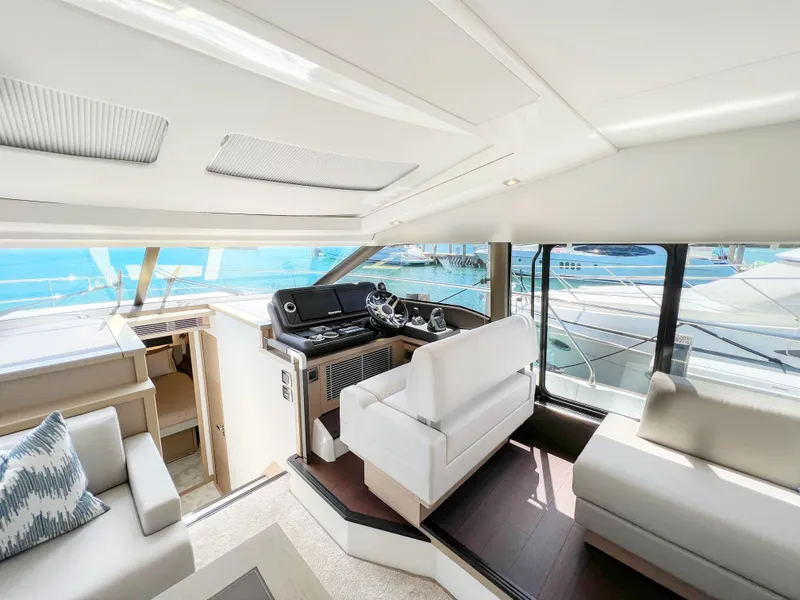 Slide: The Image of Interior of 2020 Prestige 520 S yacht with modern helm and seating area. - 12