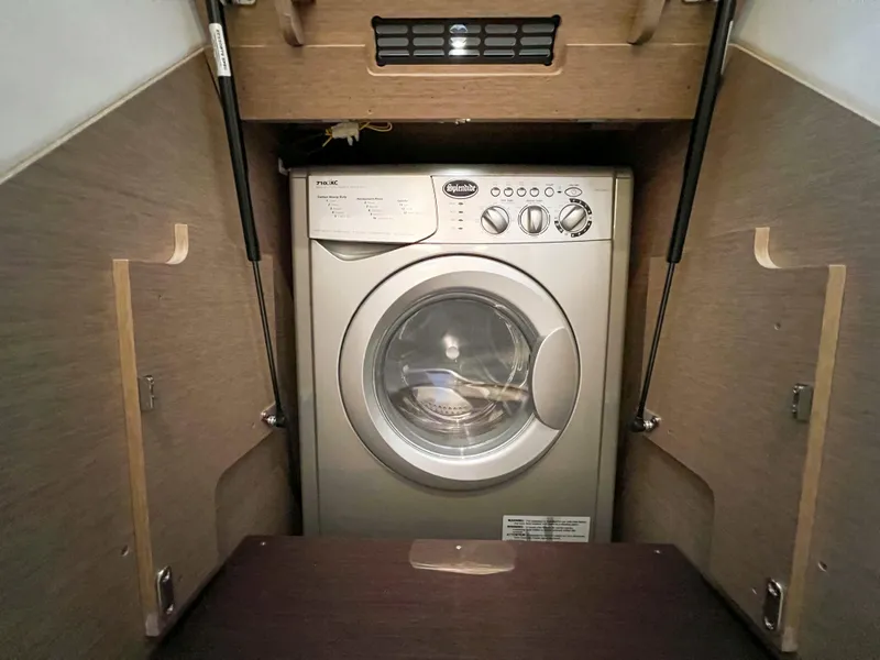 Slide: The Image of Washing machine in the laundry area of a 2020 Prestige 520 S yacht. - 17