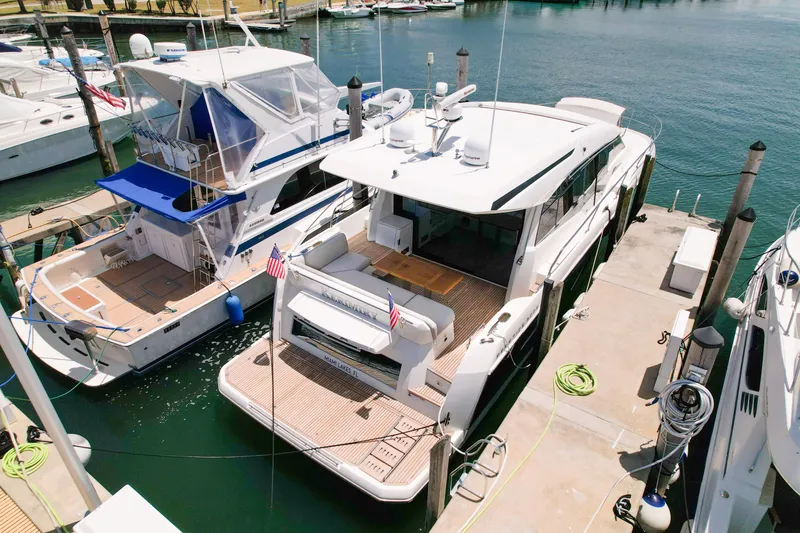 Slide: The Image of Prestige 520 S 2020 yacht docked at marina, aerial view. - 3