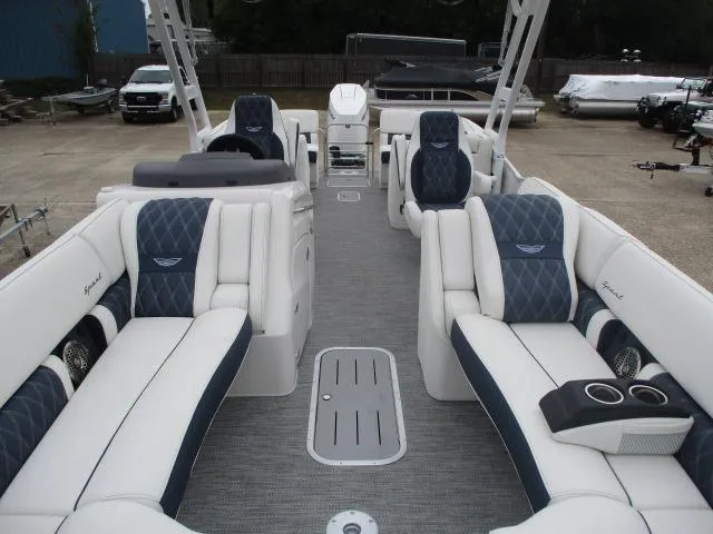 Slide: The Image of 2023 Bennington 25QFBA pontoon boat with luxurious seating and modern design. - 7