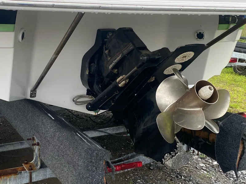 Slide: The Image of 2008 Regal 2400 BR boat propeller and stern drive on a trailer. - 2