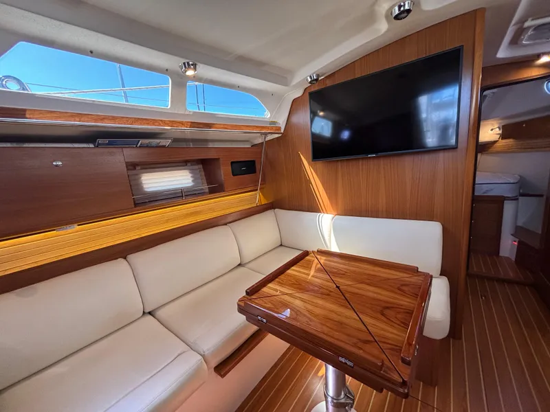 Slide: The Image of Interior of 2019 Catalina 385 yacht with modern seating and wooden finishes. - 20