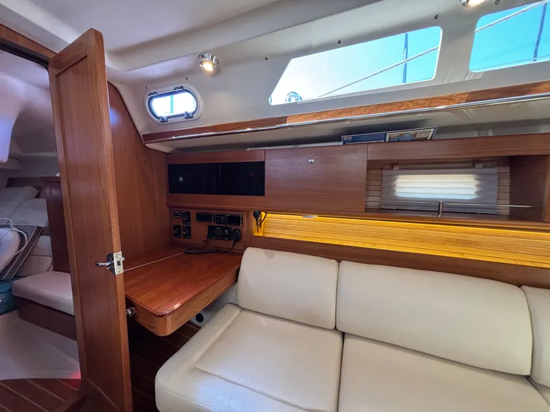 Slide: The Image of Interior of 2019 Catalina 385 sailboat with wooden accents and comfortable seating. - 26