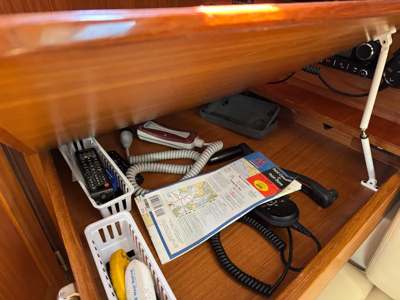 Slide: The Image of 2019 Catalina 385 yacht interior with navigation tools and communication equipment. - 28