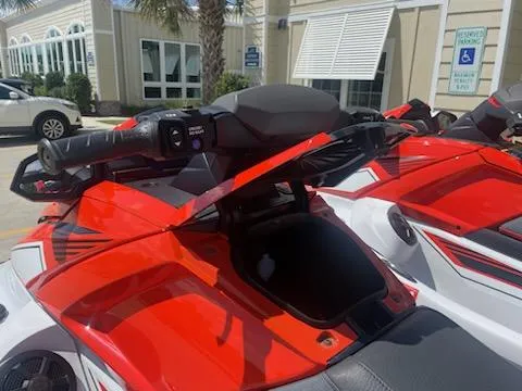 Slide: The Image of 2021 Yamaha WaveRunner VX Cruiser in red and white, close-up of handlebars and storage compartment. - 4