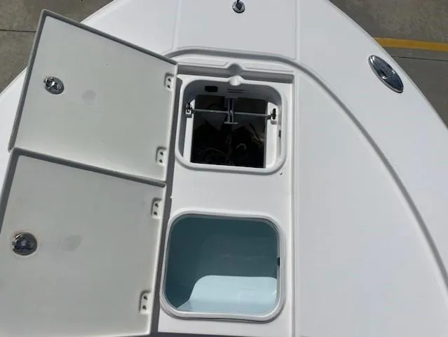 Slide: The Image of 2016 Robalo 246 Cayman boat storage compartments and anchor locker. - 15