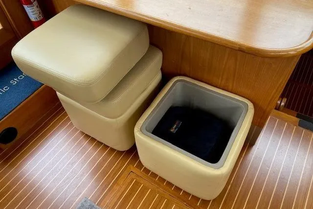 Slide: The Image of Interior of 2002 Grand Banks 46 Classic with beige seating and wooden flooring. - 15