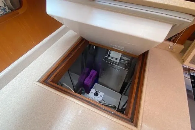 Slide: The Image of Engine compartment access on 2002 Grand Banks 46 Classic yacht. - 20