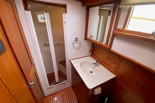 Slide: The Image of Bathroom interior of 2002 Grand Banks 46 Classic yacht with shower and sink. - 38