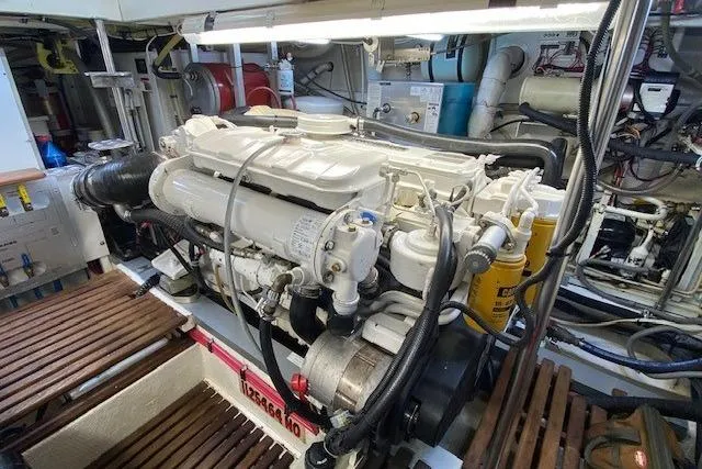 Slide: The Image of Engine room of 2002 Grand Banks 46 Classic yacht, showcasing detailed machinery and components. - 40
