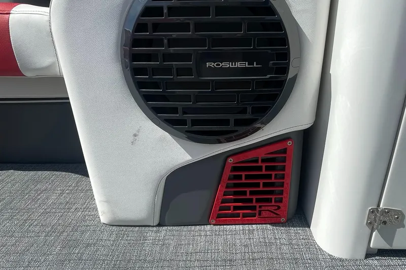 Slide: The Image of 2023 Berkshire 23 RFX STS boat interior with Roswell speaker and red accent. - 19