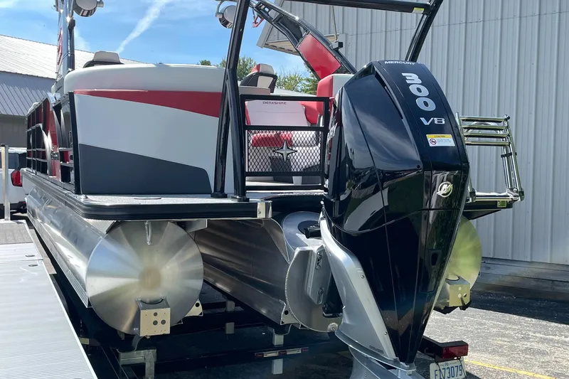 Slide: The Image of 2023 Berkshire 23 RFX STS pontoon boat with 300 HP outboard motor. - 2