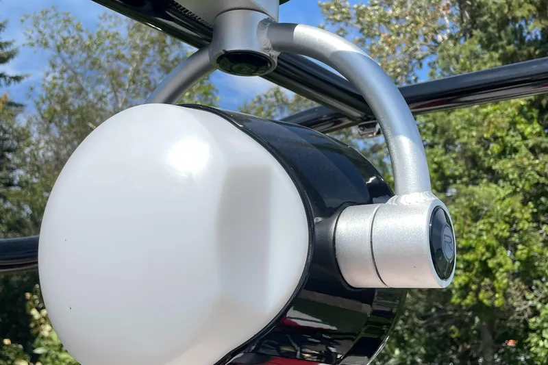 Slide: The Image of Close-up of a 2023 Berkshire 23 RFX STS boat's navigation light. - 21