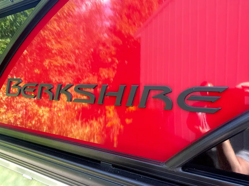 Slide: The Image of 2023 Berkshire 23 RFX STS boat with red exterior and black logo - 7