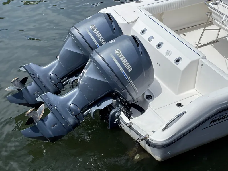 Slide: The Image of 1999 Boston Whaler Outrage 23 with twin Yamaha outboard motors. - 11