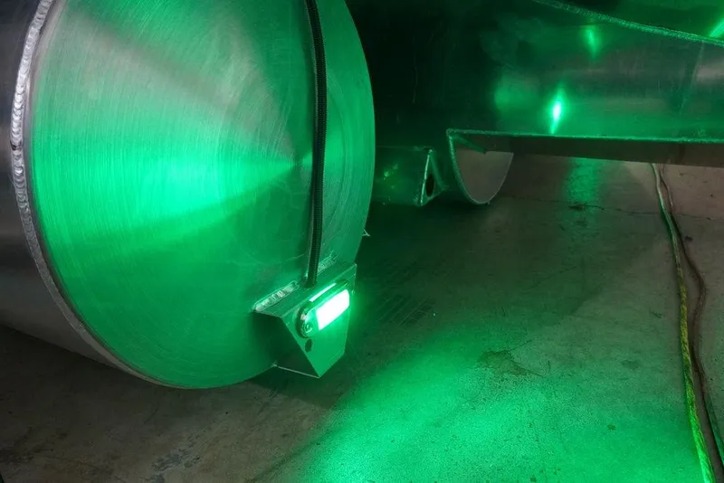 Slide: The Image of 2024 Crest Savannah 270 SLC CP3 pontoon with green LED lighting. - 13