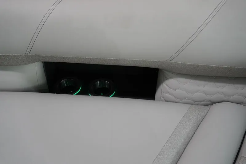Slide: The Image of 2024 Crest Savannah 270 SLC CP3 boat interior with illuminated cup holders. - 3