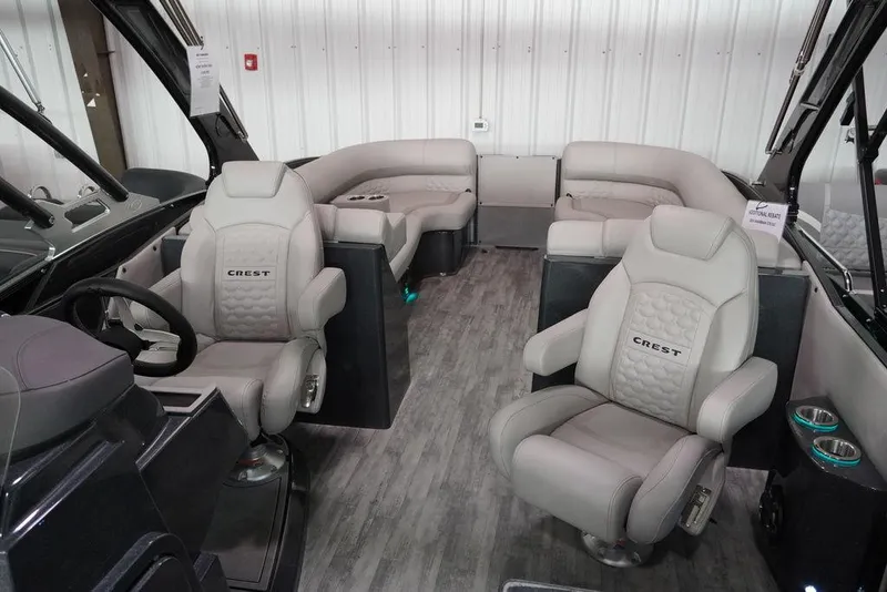 Slide: The Image of 2024 Crest Savannah 270 SLC CP3 boat interior with luxurious seating and modern design. - 5