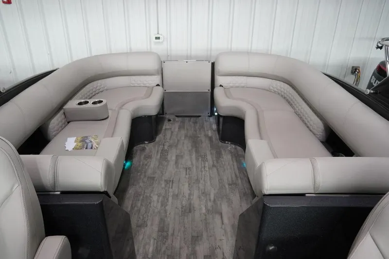 Slide: The Image of 2024 Crest Savannah 270 SLC CP3 boat interior with luxurious seating and modern design. - 8