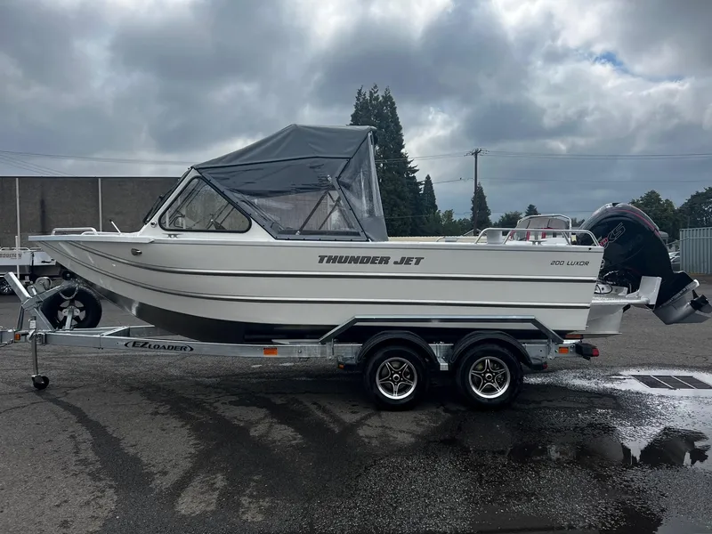 Slide: The Image of 2024 Thunder Jet 200 Luxor boat on a trailer, side view. - 5