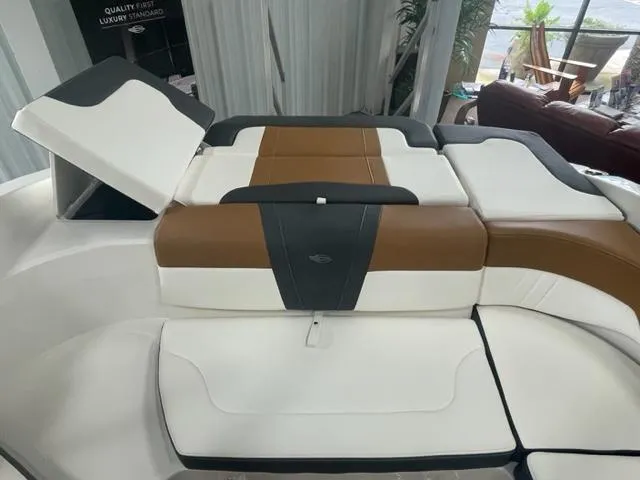 Slide: The Image of 2024 Chaparral 23 SSi boat interior with luxurious seating. - 6
