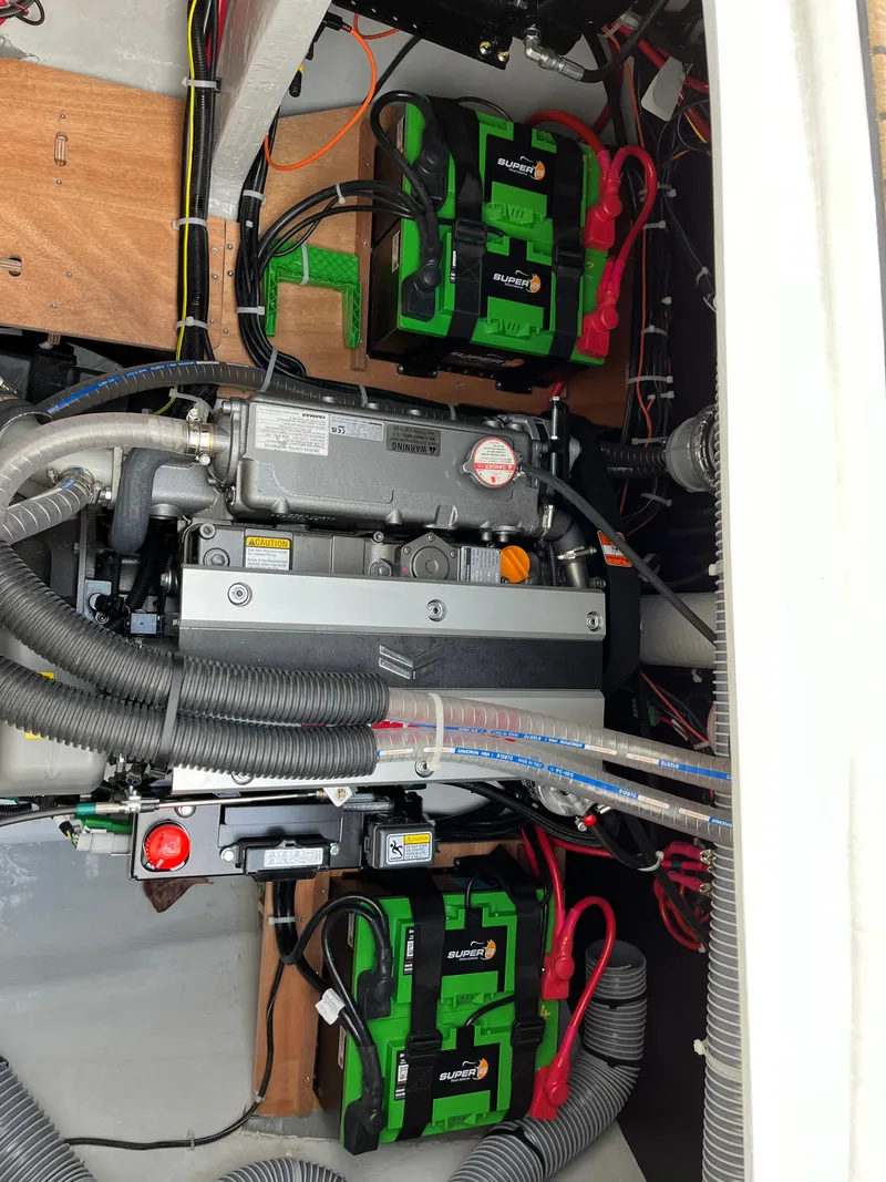 Slide: The Image of 2024 Lagoon 46 warranty sticker: 7-year structural, 5-year engine, 3-year component. - 12