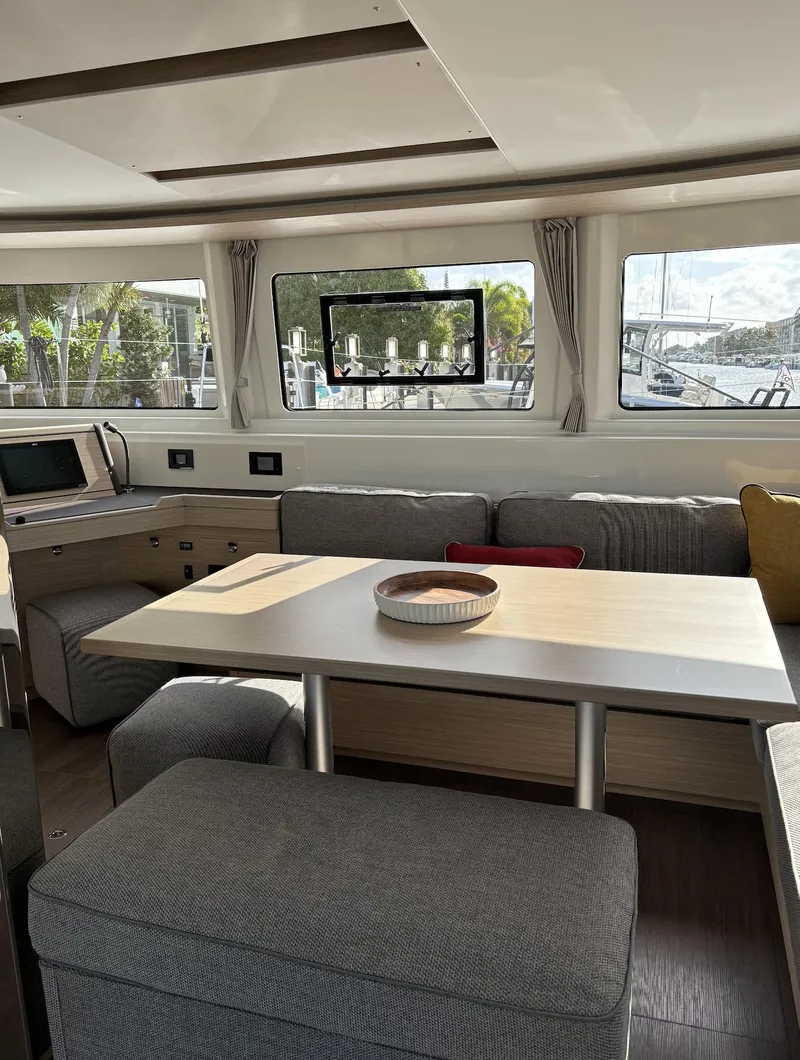 Slide: The Image of Engine compartment of 2024 Lagoon 46 catamaran with mechanical components. - 30