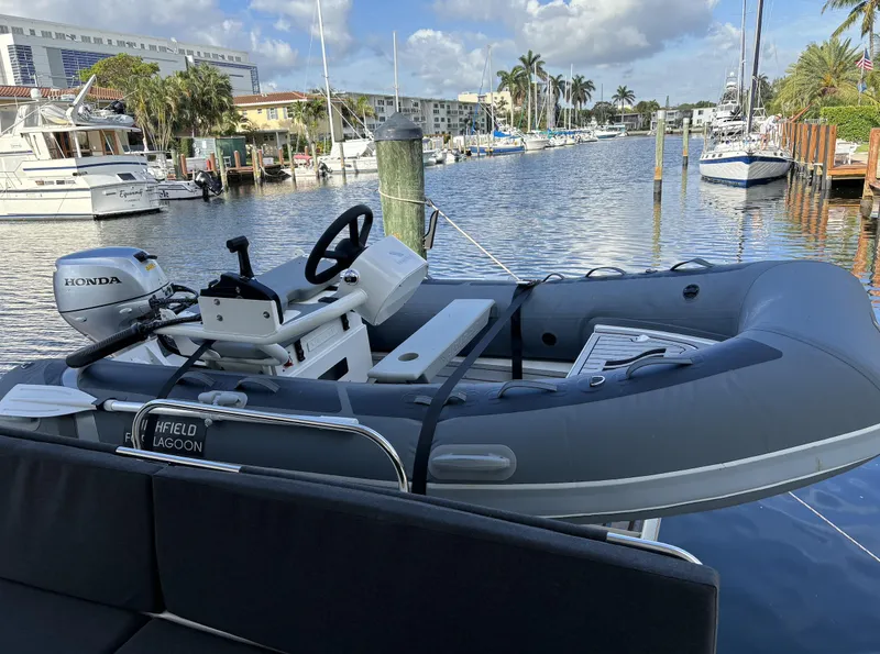 Slide: The Image of Luxurious interior of 2024 Lagoon 46 yacht with elegant dining and modern kitchen. - 36