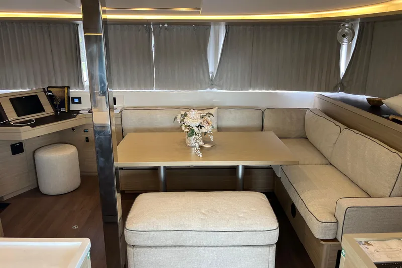 Slide: The Image of Luxurious interior of 2024 Lagoon 46 yacht with elegant seating and modern decor. - 54