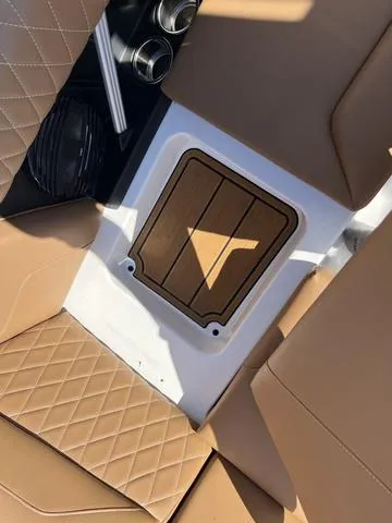Slide: The Image of Interior seating and storage compartment of 2023 Tigé Z3 boat. - 16