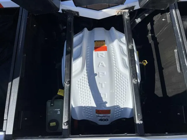 Slide: The Image of 2023 Tigé Z3 boat engine compartment with Raptor 400 engine. - 19