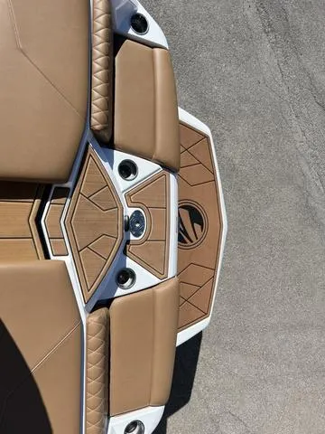 Slide: The Image of 2023 Tigé Z3 boat with tan upholstery and stylish deck design. - 20