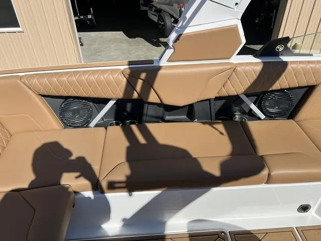 Slide: The Image of 2023 Tigé Z3 boat with tan leather seating and built-in speakers. - 7