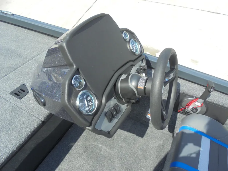 Slide: The Image of 2024 Ranger RT178C boat cleat on sleek deck with striped design. - 12