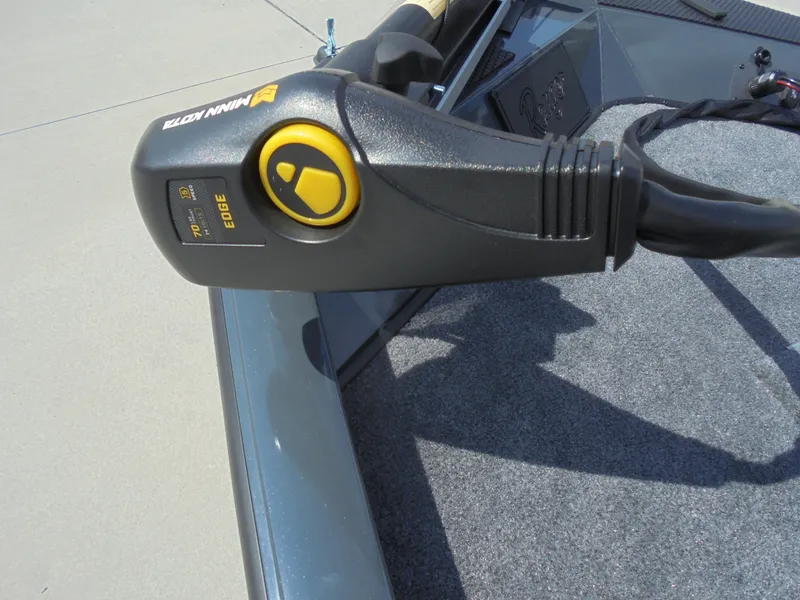 Slide: The Image of 2024 Ranger RT178C boat storage compartment with red and yellow gear bag. - 17