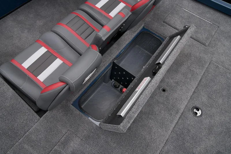 Slide: The Image of 2024 Ranger RT178C boat interior with open storage compartment and cushioned seating. - 33