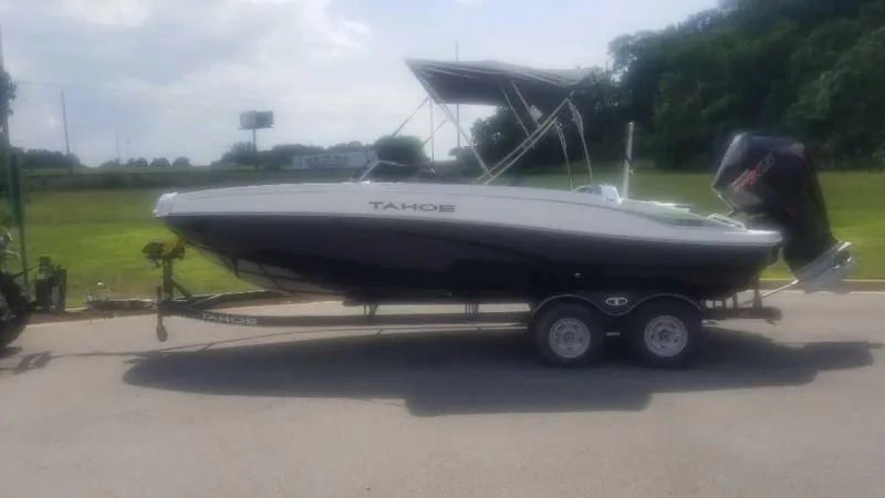 Slide: The Image of 2024 Tahoe T21 boat interior, aerial view, featuring spacious seating and modern design. - 2