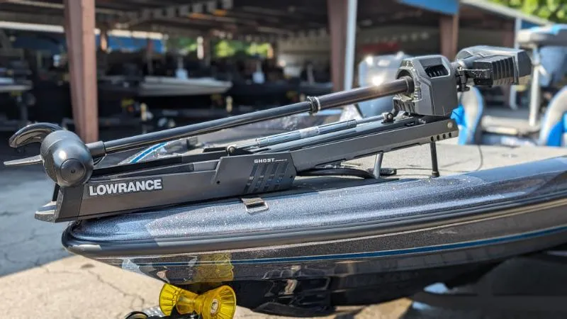 Slide: The Image of 2024 Triton 18 TrX boat with Lowrance Ghost trolling motor. - 4