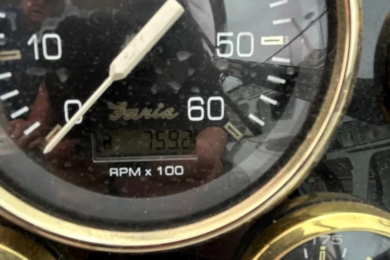 Slide: The Image of Close-up of 2000 Cruisers Yachts 3870 Express tachometer showing 759.2 hours. - 14