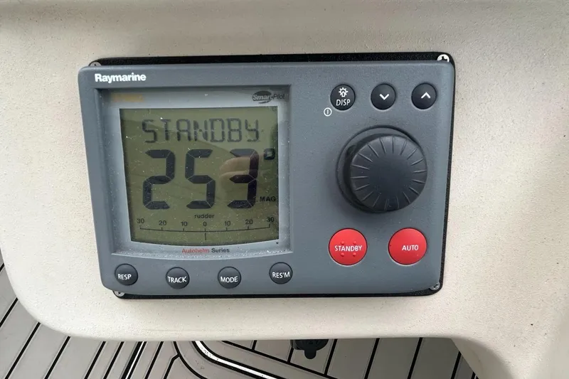 Slide: The Image of Raymarine autopilot display on 2000 Cruisers Yachts 3870 Express showing standby mode. - 17