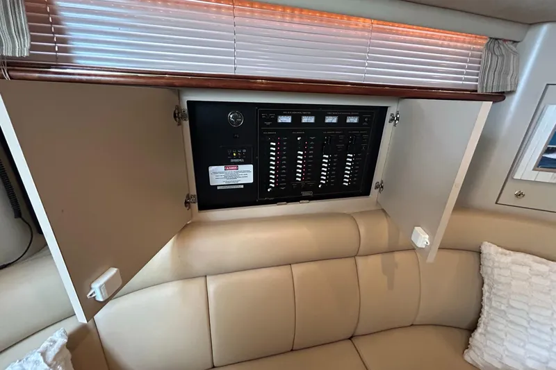 Slide: The Image of Electrical panel inside 2000 Cruisers Yachts 3870 Express cabin. - 36