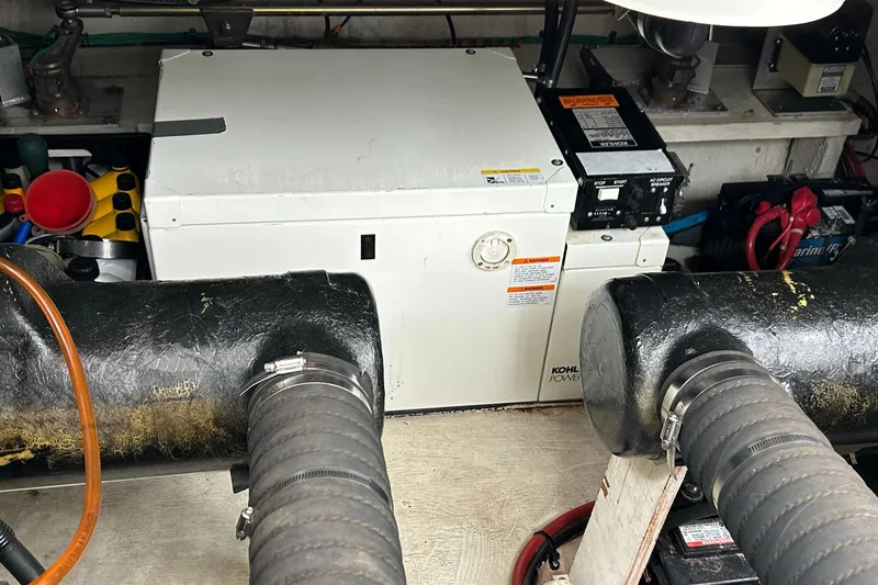 Slide: The Image of Engine room of a 2000 Cruisers Yachts 3870 Express with Kohler generator. - 4