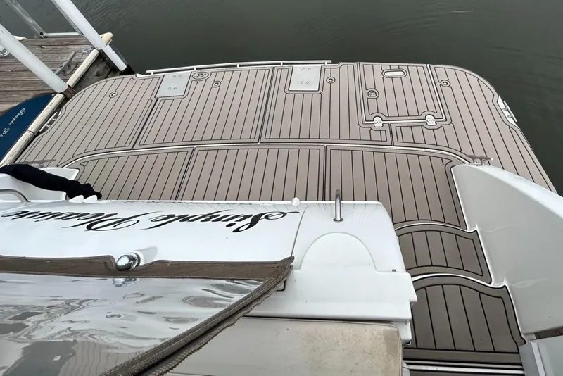 Slide: The Image of 2000 Cruisers Yachts 3870 Express swim platform with teak decking. - 7