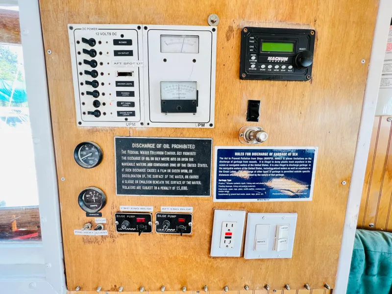 Slide: The Image of Control panel of a 1955 Colin Archer 42 boat with gauges and switches. - 12