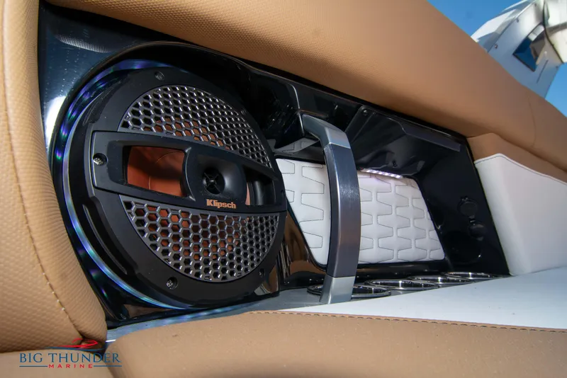 Slide: The Image of Close-up of 2023 MasterCraft X24 boat interior speaker and handle. - 22