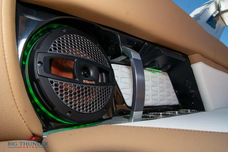 Slide: The Image of 2023 MasterCraft X24 boat interior with Klipsch speaker and Big Thunder Marine logo. - 26